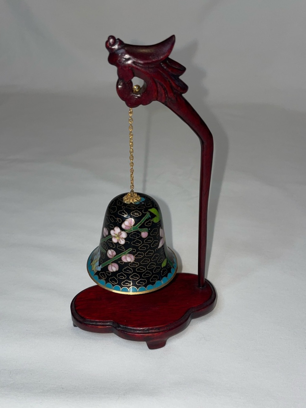 Handcrafted Black Floral Cloisonné Bell with Red Wooden Stand
